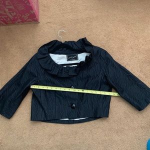 Dressy black jacket, bound buttonholes